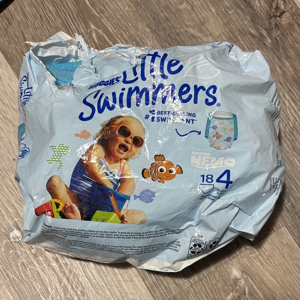FREE WITH PURCHASE Huggies Little Swimmers Size 4 Diapers